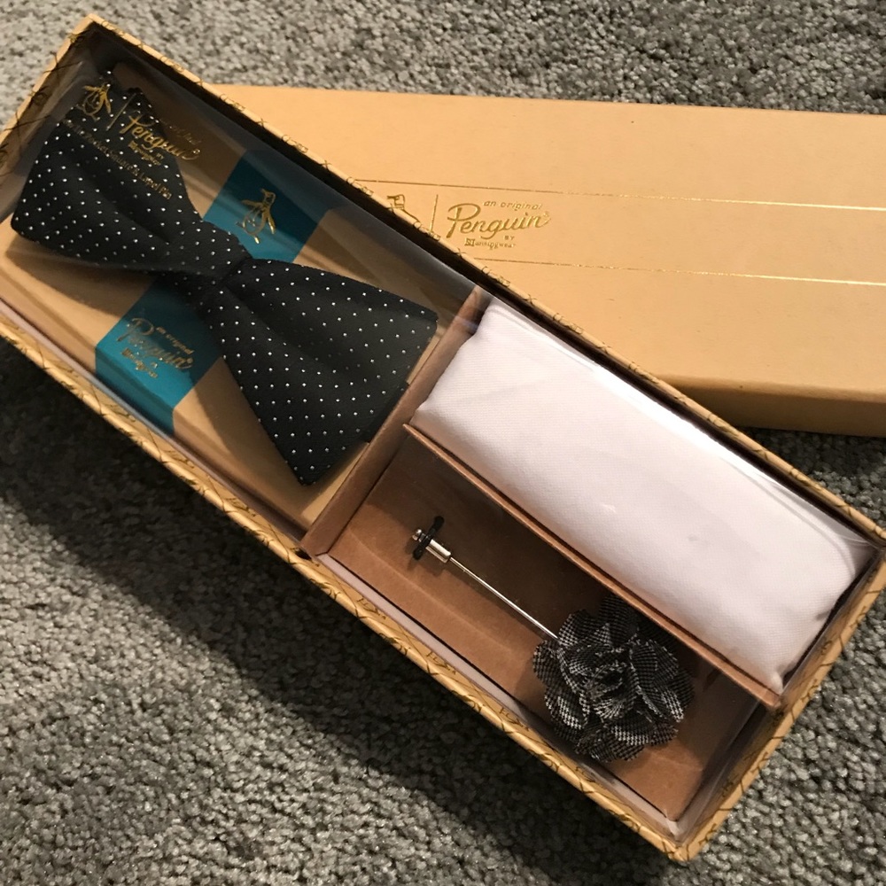 Penguin Bow tie, pocket square, and lapel pin.
